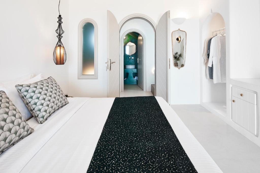Łóżko lub łóżka w pokoju w obiekcie Star Infinity Suites