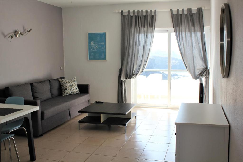 a living room with a couch and a table at Apartamento II Callao Salvaje in Callao Salvaje