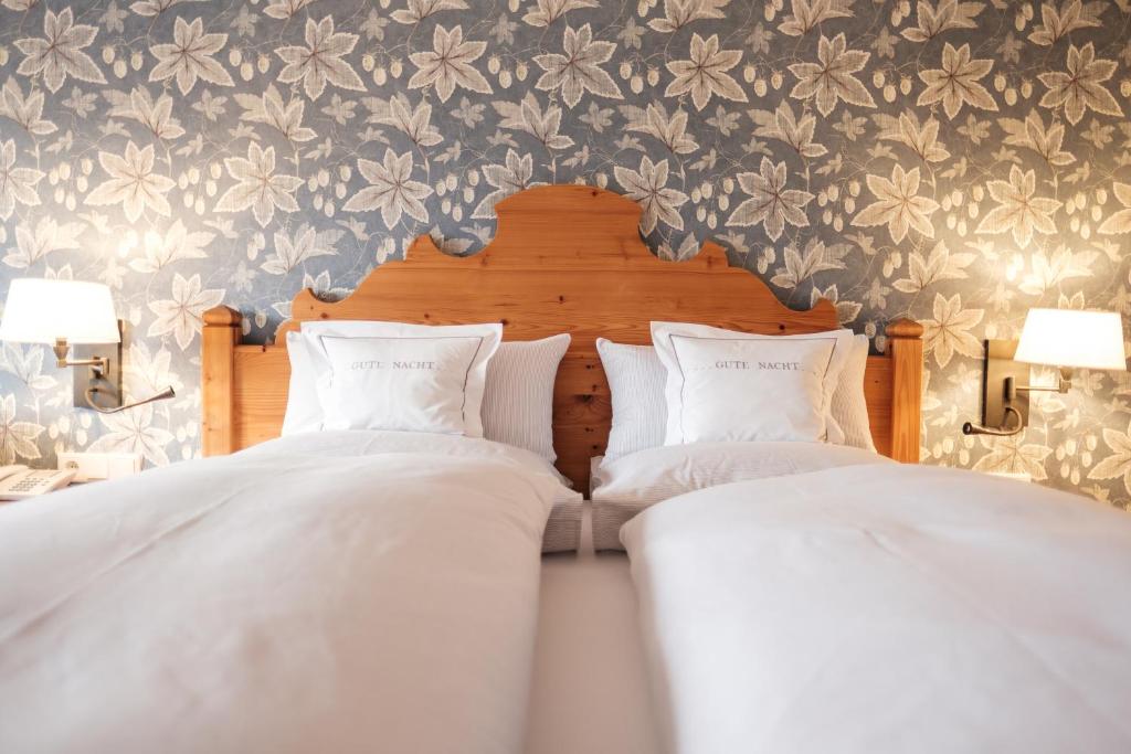 Postel nebo postele na pokoji v ubytování Landhaus am Stein