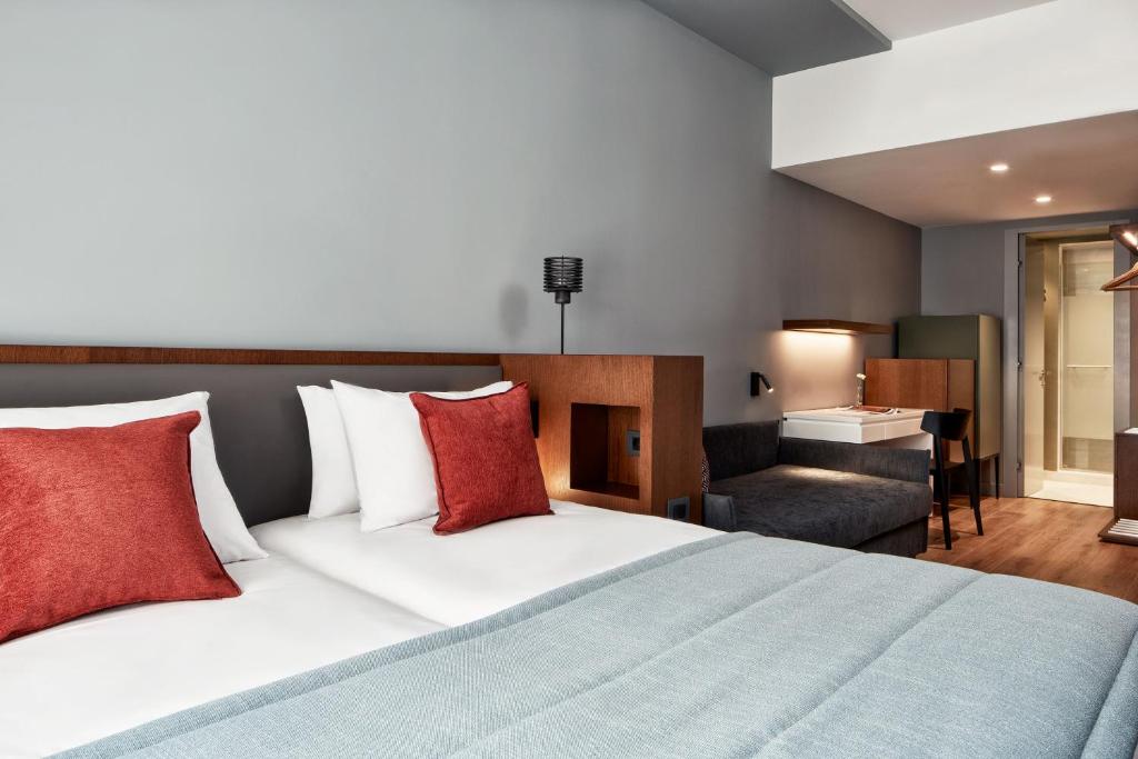 Postel nebo postele na pokoji v ubytování Hotel Achilleas
