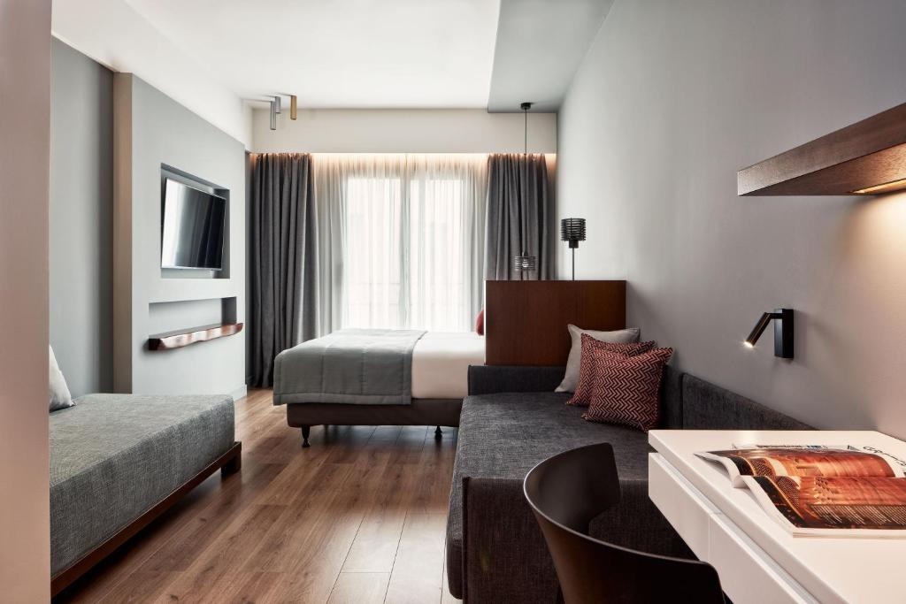 TV a/nebo společenská místnost v ubytování Hotel Achilleas