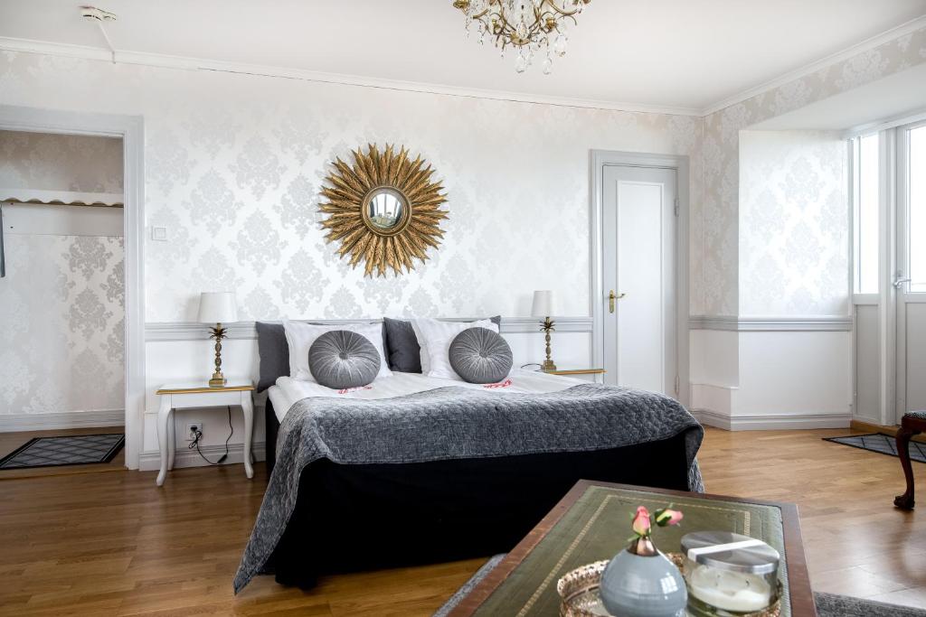 Postel nebo postele na pokoji v ubytování Hotel Gyllene Uttern