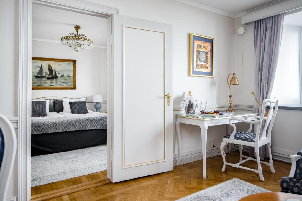 Postel nebo postele na pokoji v ubytování Hotel Gyllene Uttern