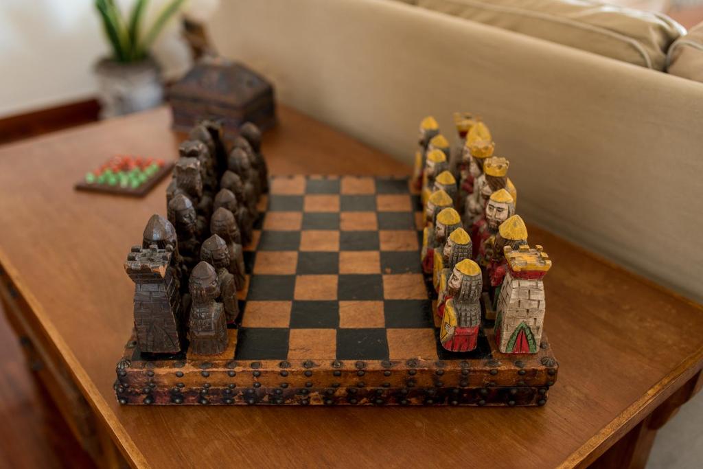 a chess board on top of a table at Family getaway, spacious and luxurious, sea view, terrace, next to Voula beach, 20min from center in Athens