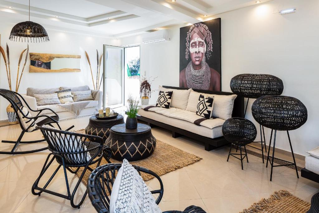 Гостиная зона в Nostos Beach Boutique Hotel