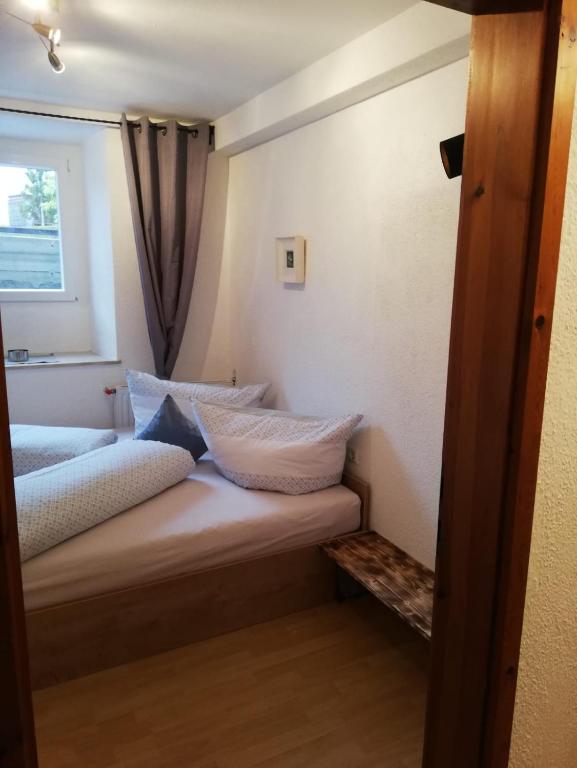 Posteľ alebo postele v izbe v ubytovaní Ferienwohnung Haus File