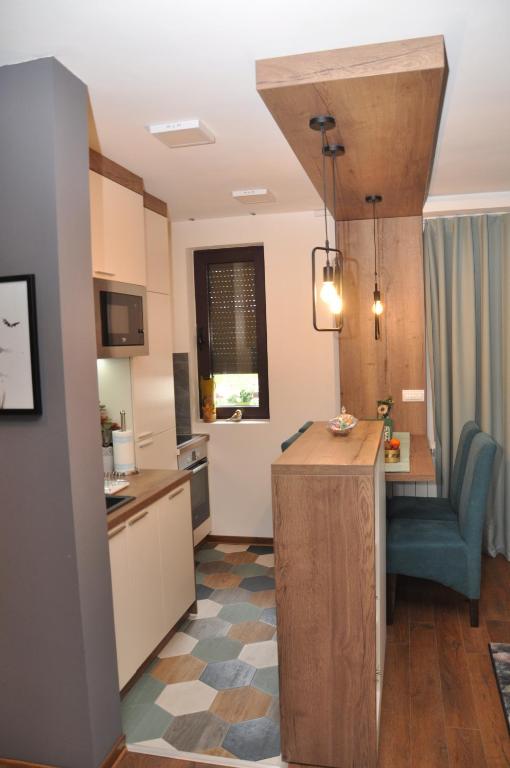 Kuchyň nebo kuchyňský kout v ubytování Lux apartman Čačak