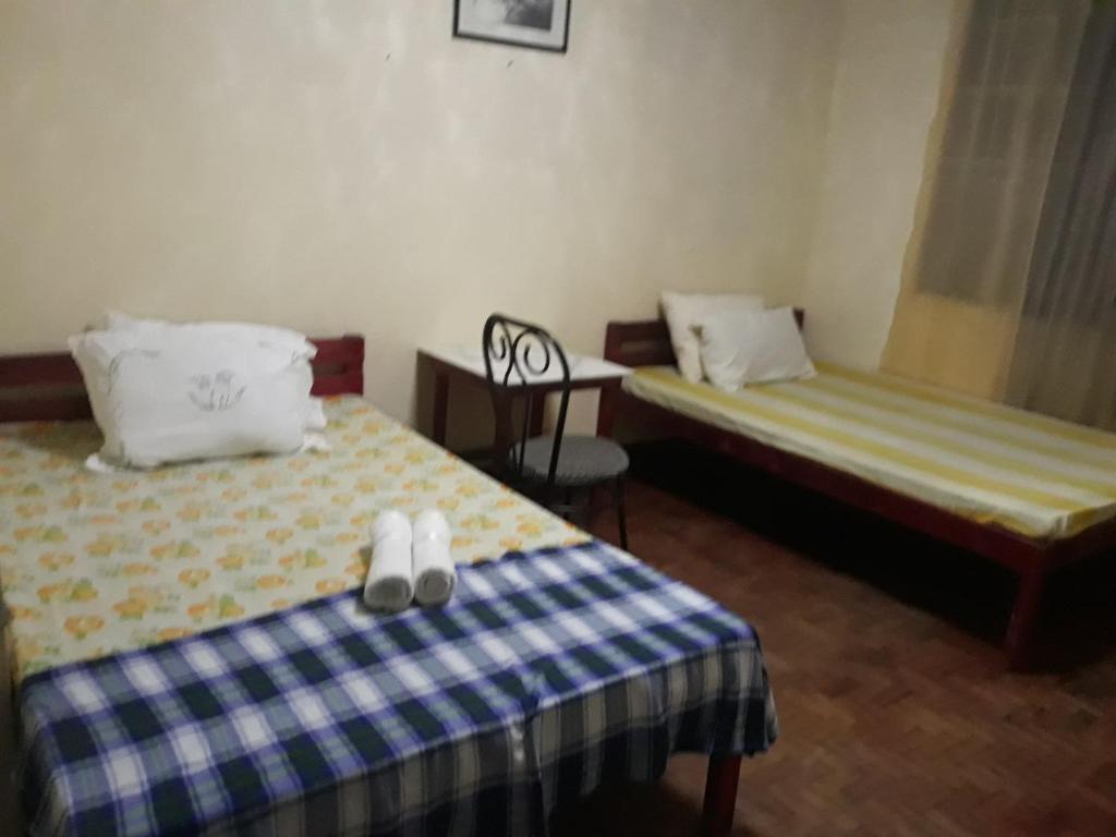 Postel nebo postele na pokoji v ubytování cv bed n bath san juan