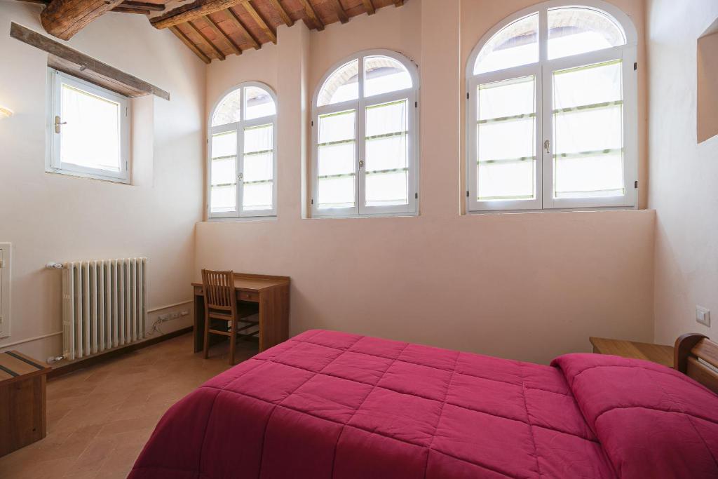 Łóżko lub łóżka w pokoju w obiekcie B&B San Francesco
