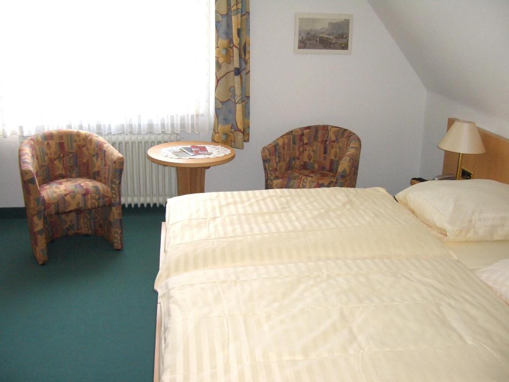 Postel nebo postele na pokoji v ubytování Hotel Ohrberg