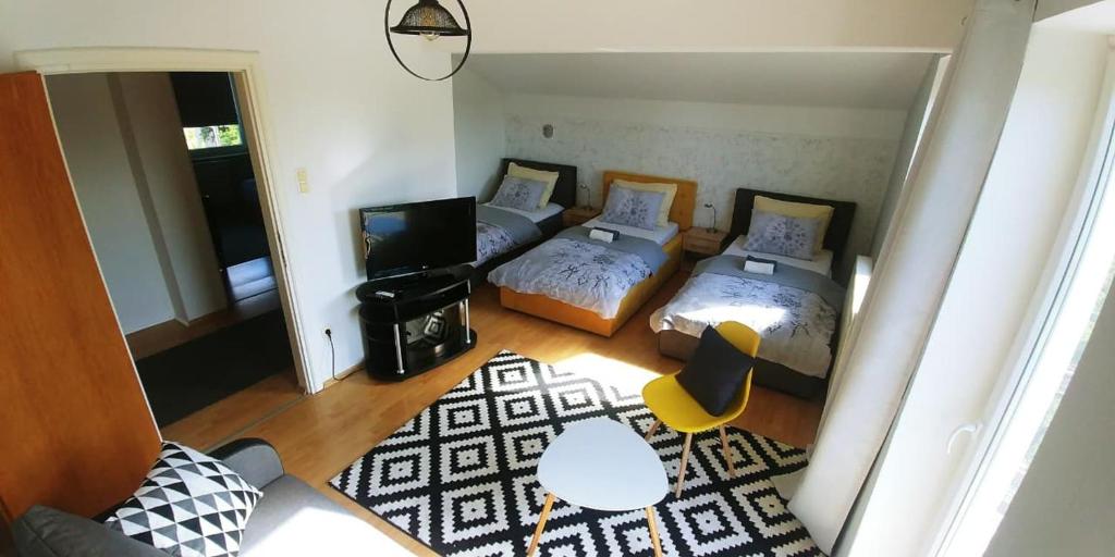 Postel nebo postele na pokoji v ubytování Guesthouse Una 1 Bihac