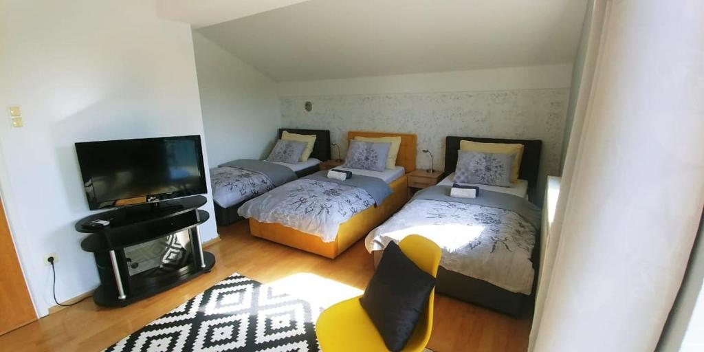 Postel nebo postele na pokoji v ubytování Guesthouse Una 1 Bihac