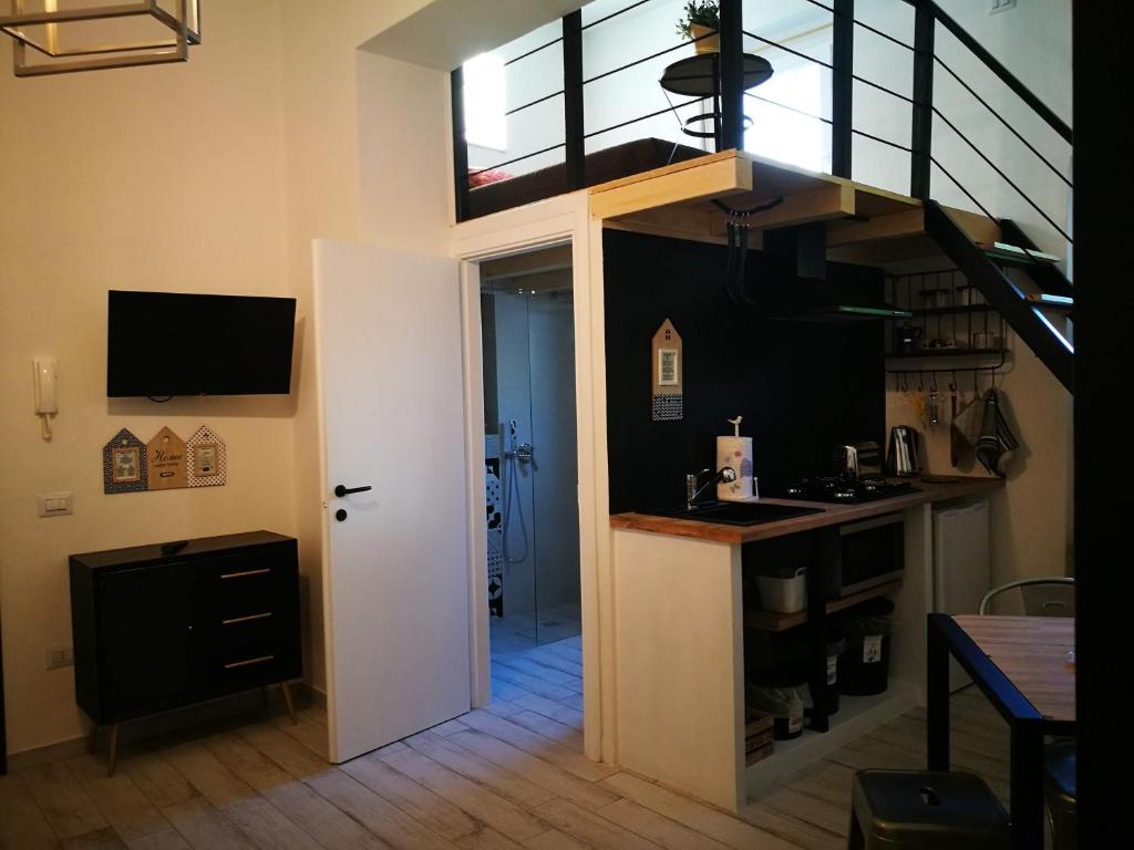 Kuchyň nebo kuchyňský kout v ubytování Amelia Apts & Rooms