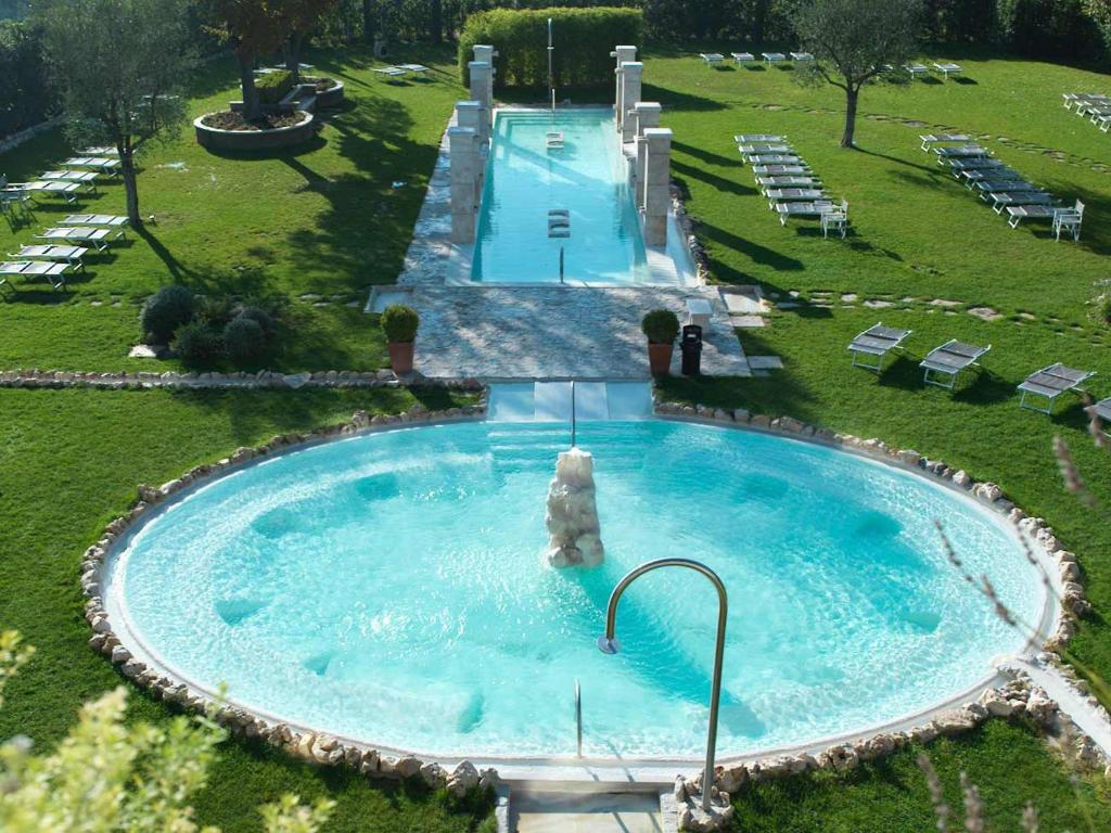 an overhead view of a swimming pool in a field at Hotel Salus Terme - Adults Only in Viterbo