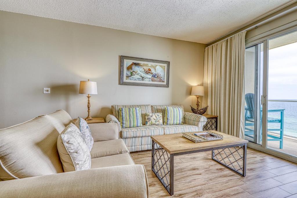 a living room with a couch and a table at Sterling Sands 803 Destin (Condo) in Destin