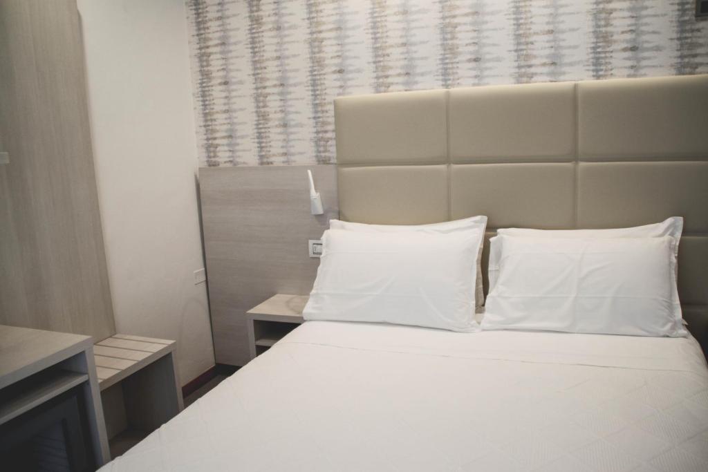 Postel nebo postele na pokoji v ubytování Hotel Gaby