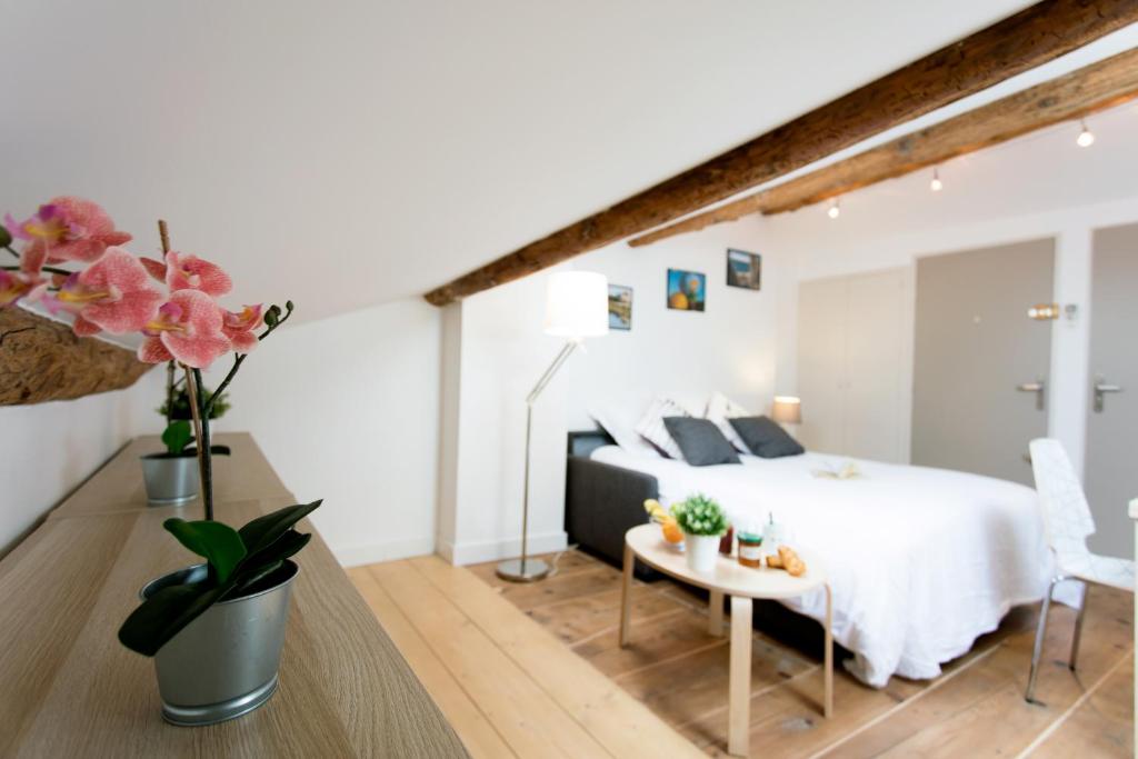 Giường trong phòng chung tại Elia mediterranee - Premiere conciergerie