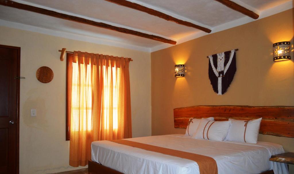 Una cama o camas en una habitación de Casa San Juan