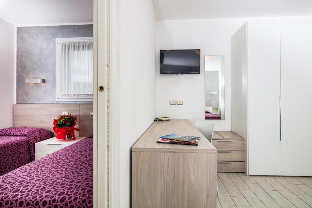 Postel nebo postele na pokoji v ubytování Hotel Ambassador Meuble