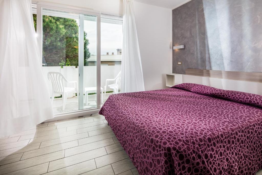 Postel nebo postele na pokoji v ubytování Hotel Ambassador Meuble