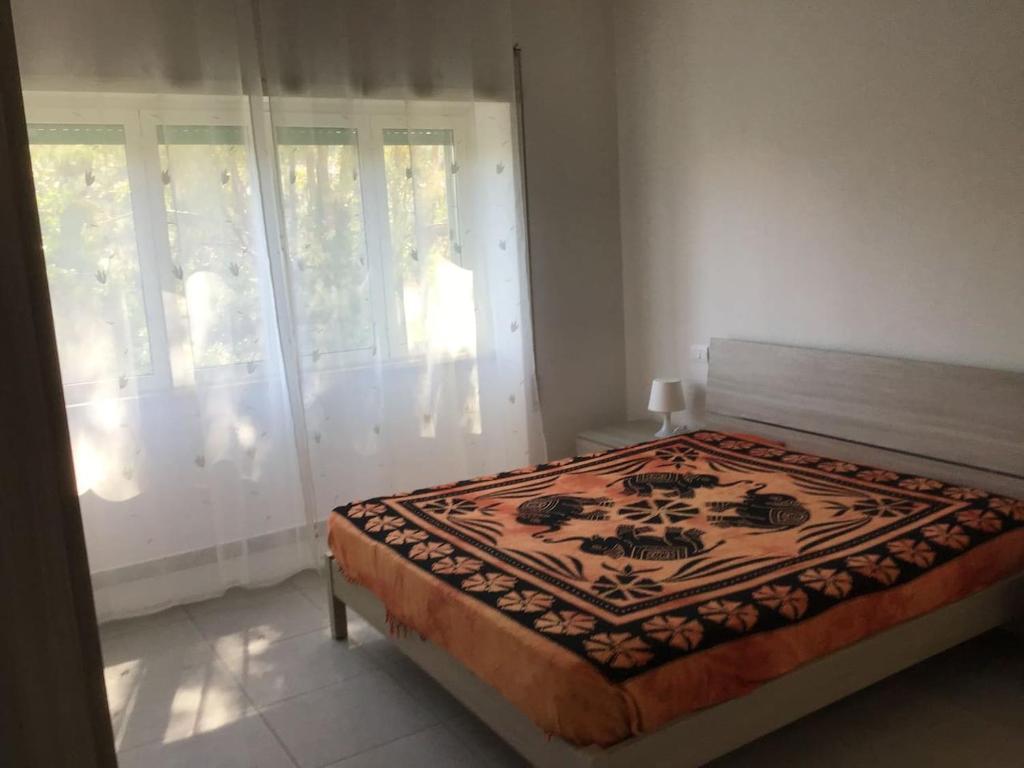 Postel nebo postele na pokoji v ubytování MELOGRANO