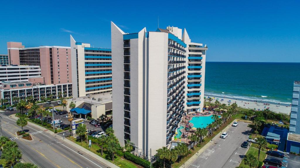an aerial view of a large building near the ocean at Ocean Reef Resort in Myrtle Beach
