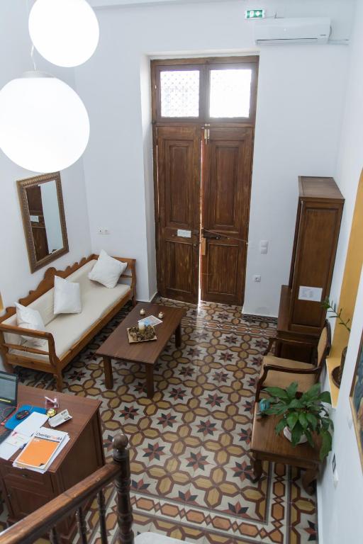 Postel nebo postele na pokoji v ubytování Douskos Guesthouse