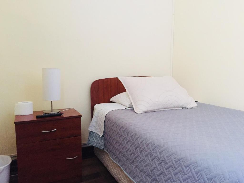 Postel nebo postele na pokoji v ubytování Hostal Rama & CaStle