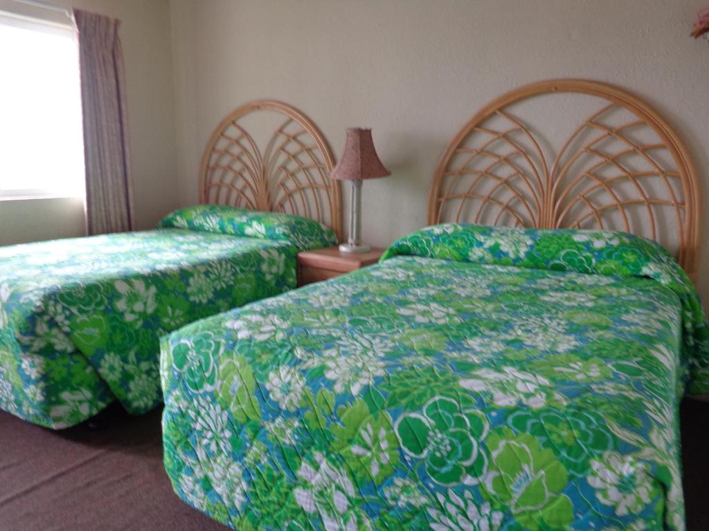 Postel nebo postele na pokoji v ubytování Fountain Motel