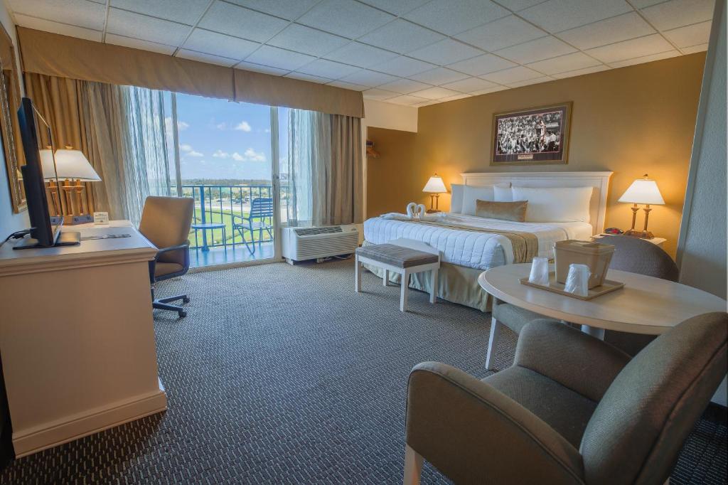 Postel nebo postele na pokoji v ubytování Stadium Hotel