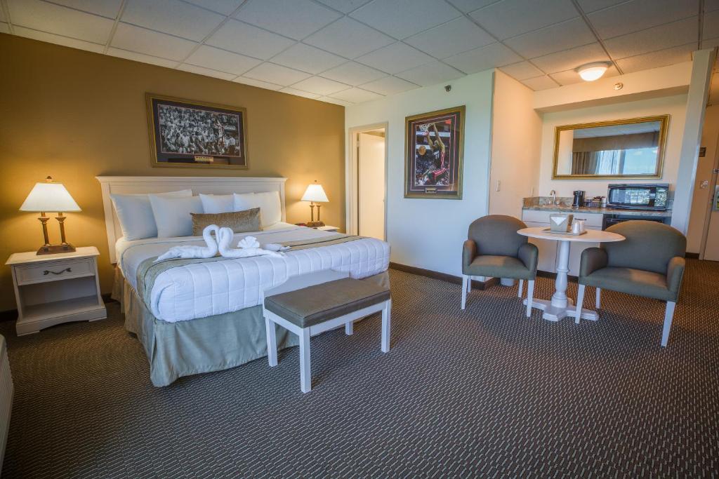 Postel nebo postele na pokoji v ubytování Stadium Hotel