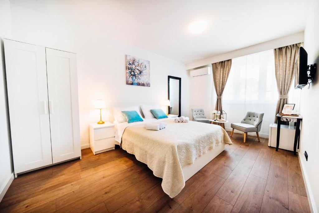Posteľ alebo postele v izbe v ubytovaní The Harmony Rooms