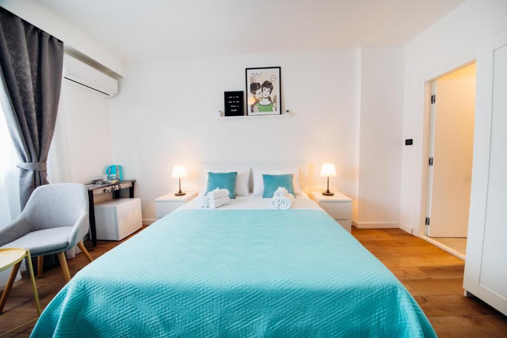 Postel nebo postele na pokoji v ubytování The Harmony Rooms