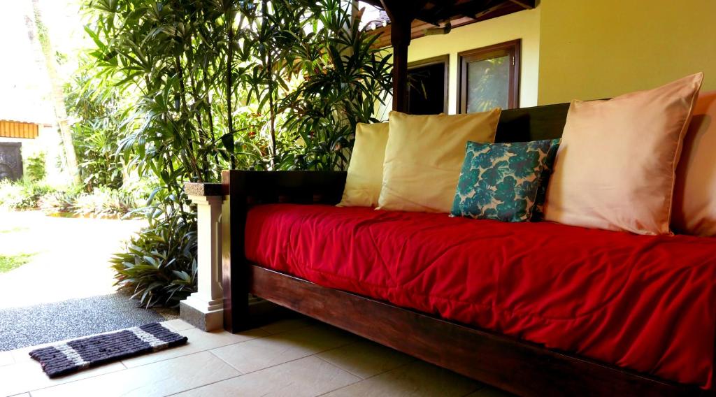 Postel nebo postele na pokoji v ubytování Istana Balian - Boutique Hotel Resort