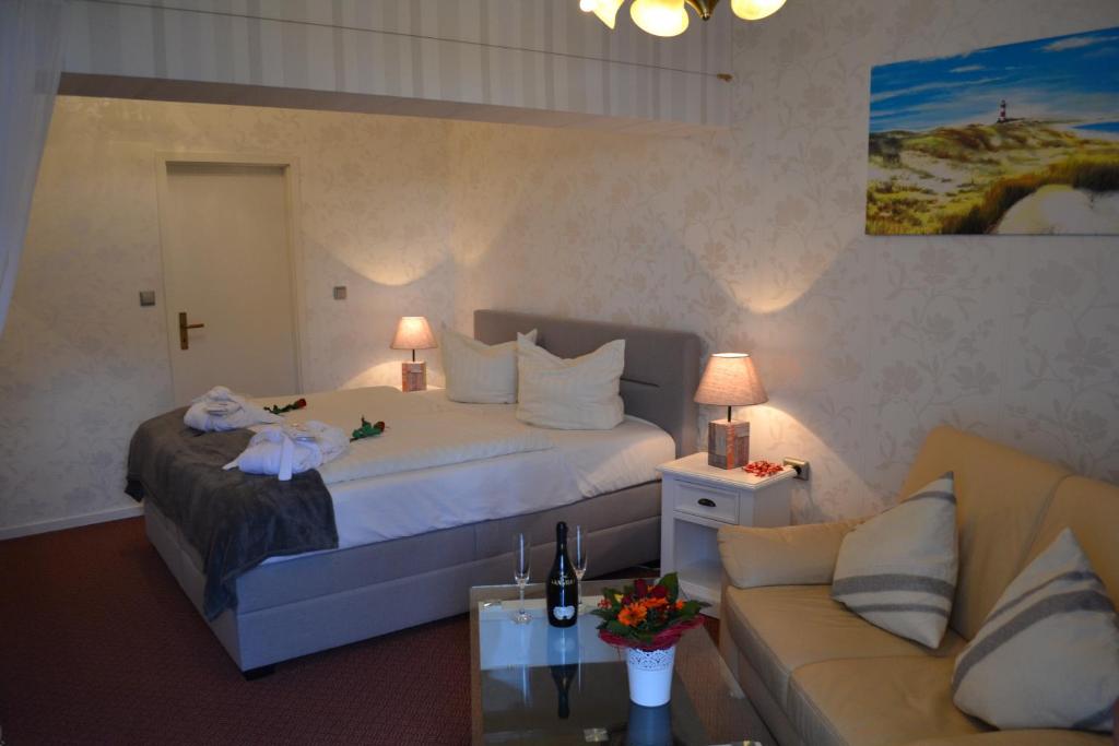 Postel nebo postele na pokoji v ubytování Hotel Hansa