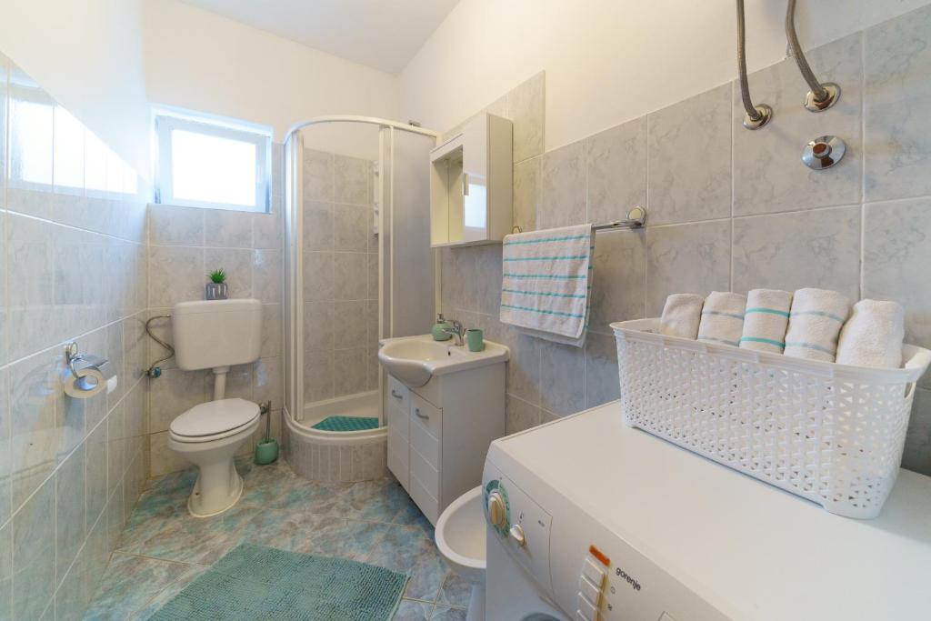 Kúpeľňa v ubytovaní Apartmani Judita