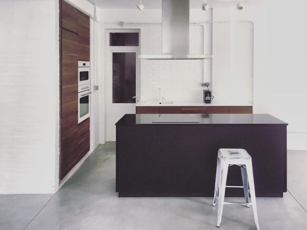 Kuchyň nebo kuchyňský kout v ubytování LOFT bed & breakfast