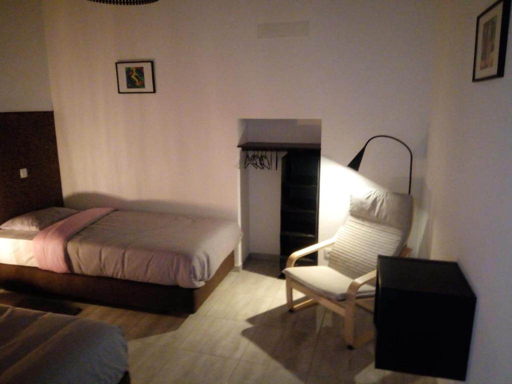 Postel nebo postele na pokoji v ubytování O Nosso Lar
