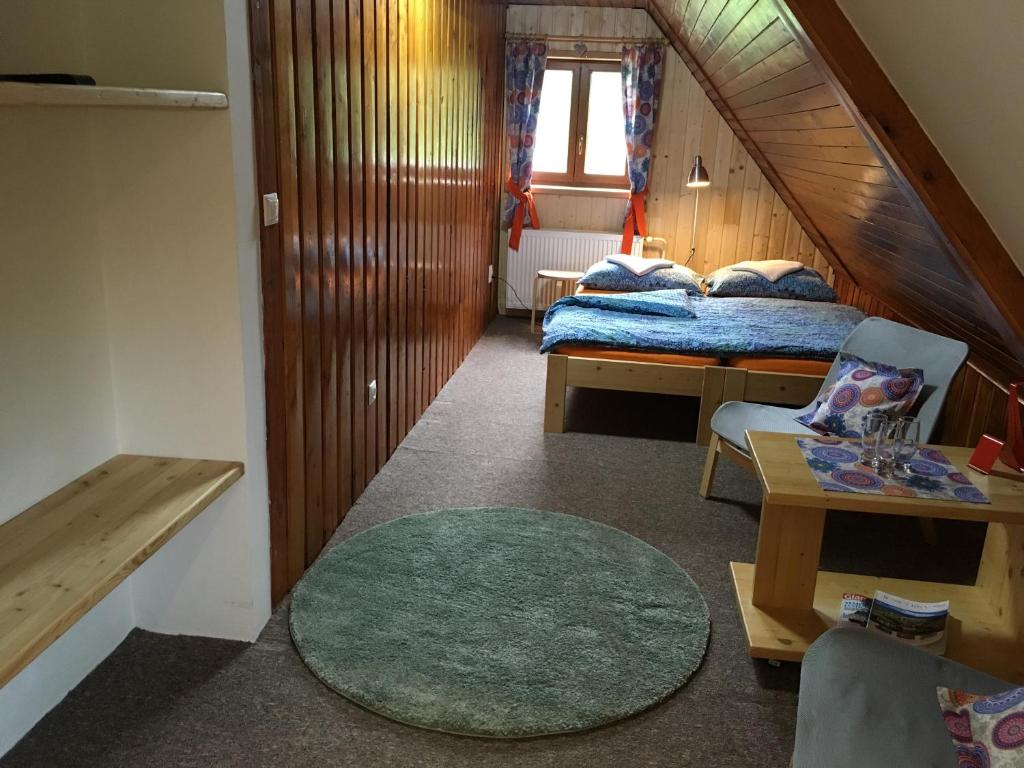 Postel nebo postele na pokoji v ubytování Penzion REHEK