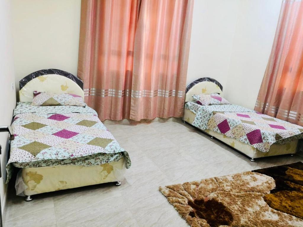 Postel nebo postele na pokoji v ubytování الجبل الاخضر Isterahat AlJabel alakhdar