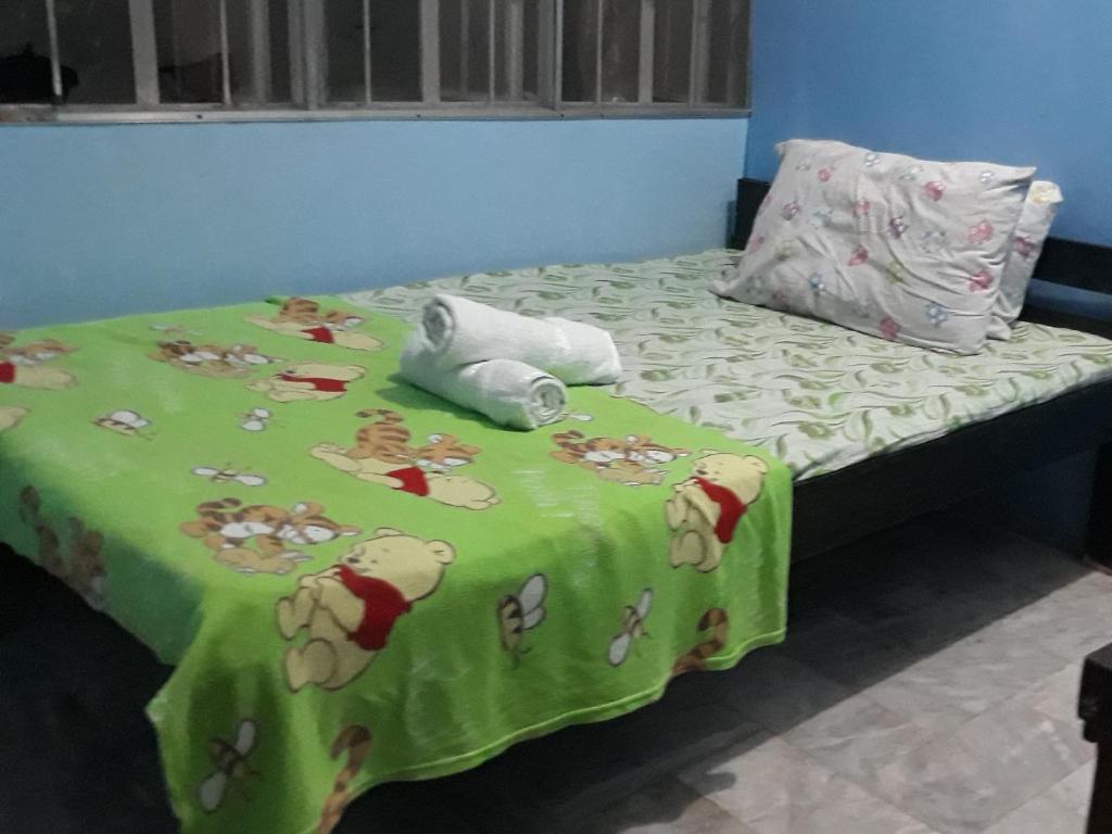 Postel nebo postele na pokoji v ubytování cv bed n bath san juan