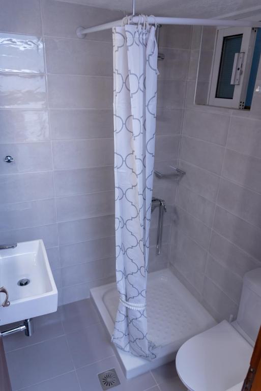 A bathroom at PANOS APARTMENTS