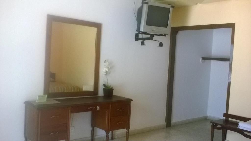 TV a/nebo společenská místnost v ubytování Hotel Playa Azul