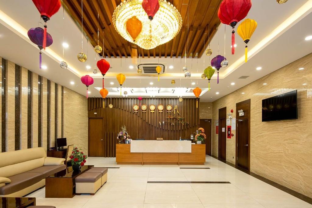 Vstupní hala nebo recepce v ubytování Mitisa Hotel Da Nang - Near Dragon Bridge