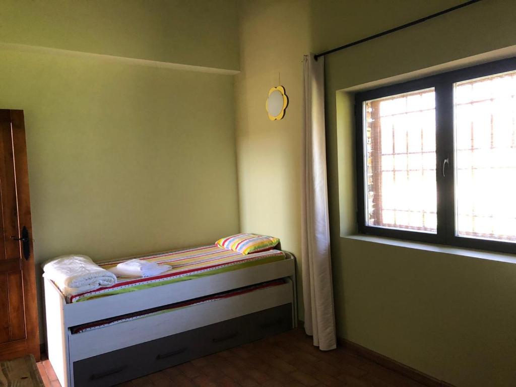Postel nebo postele na pokoji v ubytování Villa Mavi