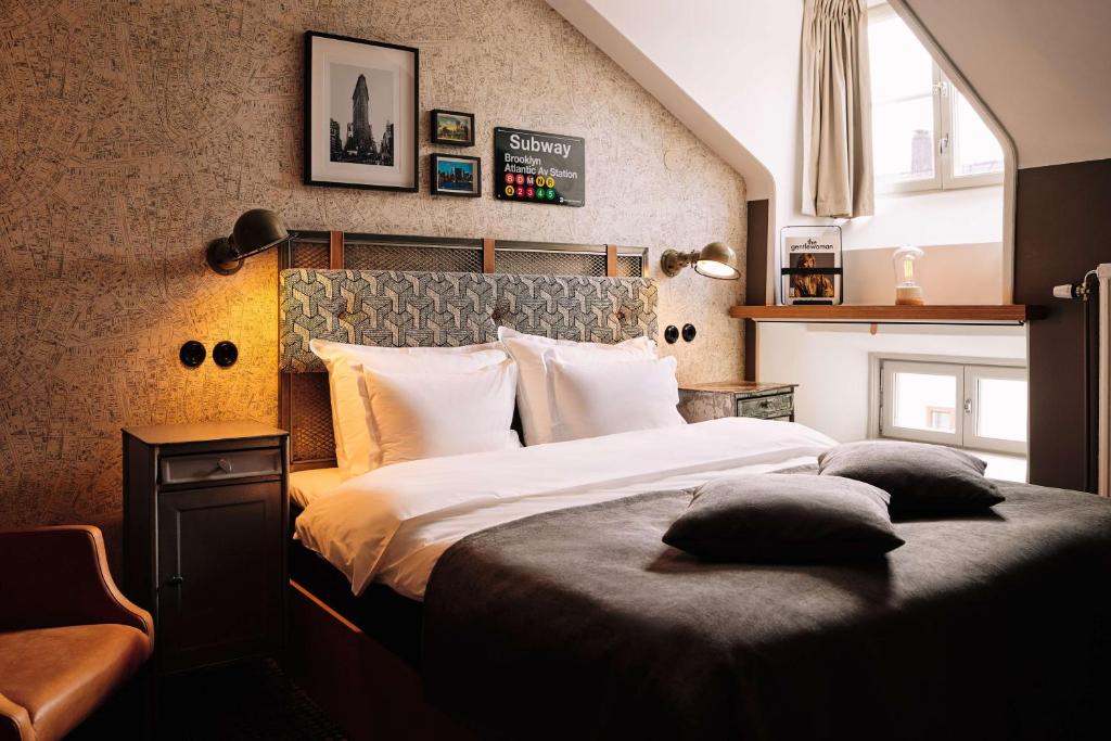 Postel nebo postele na pokoji v ubytování NOFO Hotel, WorldHotels Crafted