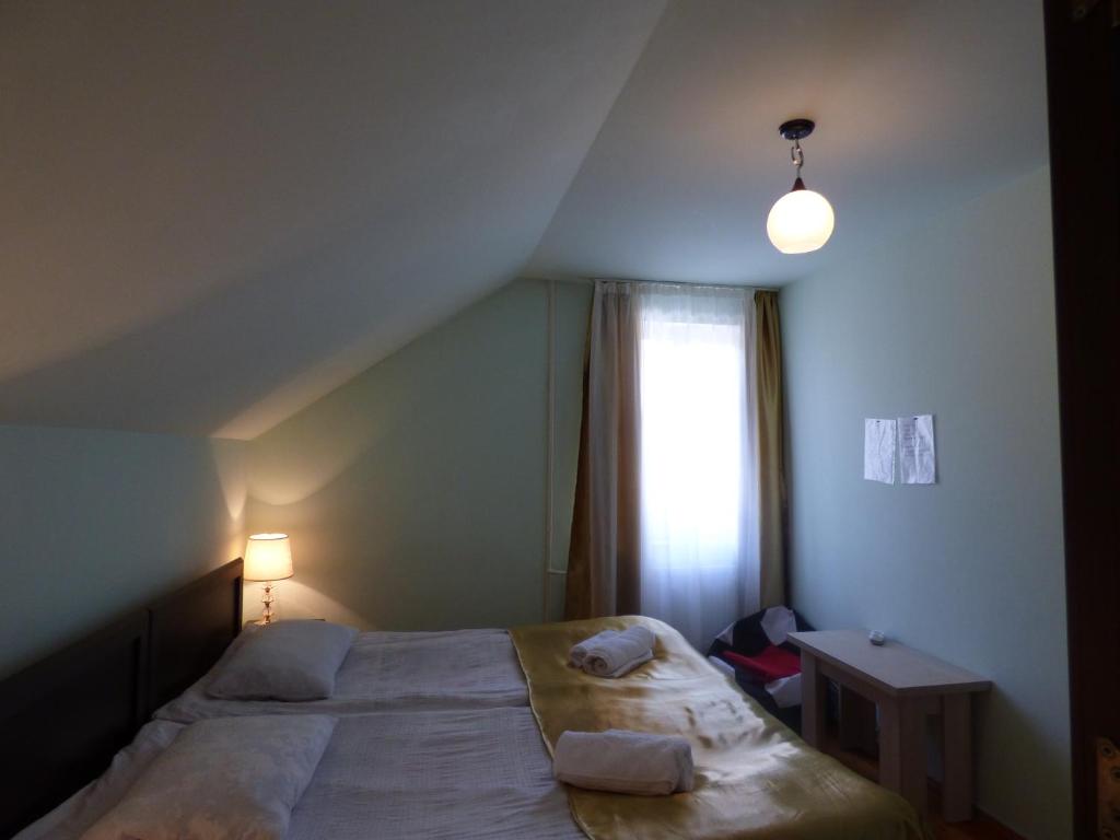 Postel nebo postele na pokoji v ubytování Anano Guest House