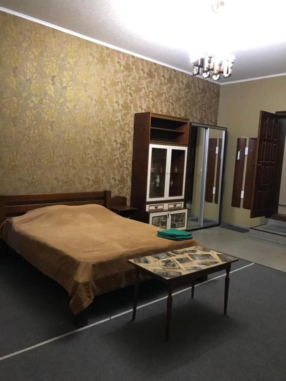 Postel nebo postele na pokoji v ubytování Moskovs'kyi Avenue 41