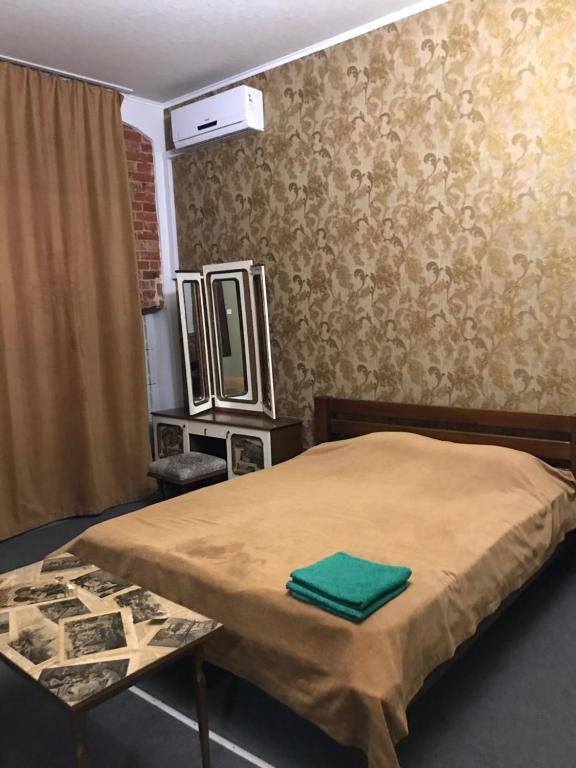 Postel nebo postele na pokoji v ubytování Moskovs'kyi Avenue 41