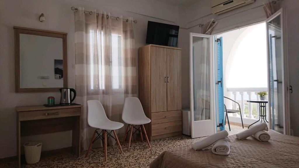 TV a/nebo společenská místnost v ubytování Firaxenia rooms